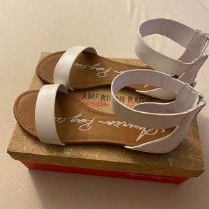 American Rag, white sandals with ankle strap, never worn.
